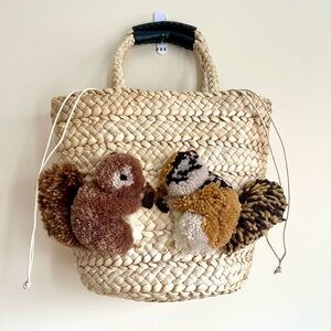 L*Space Handwoven Corn Husk Tote Bag with Hand-Embroidered Squirrels